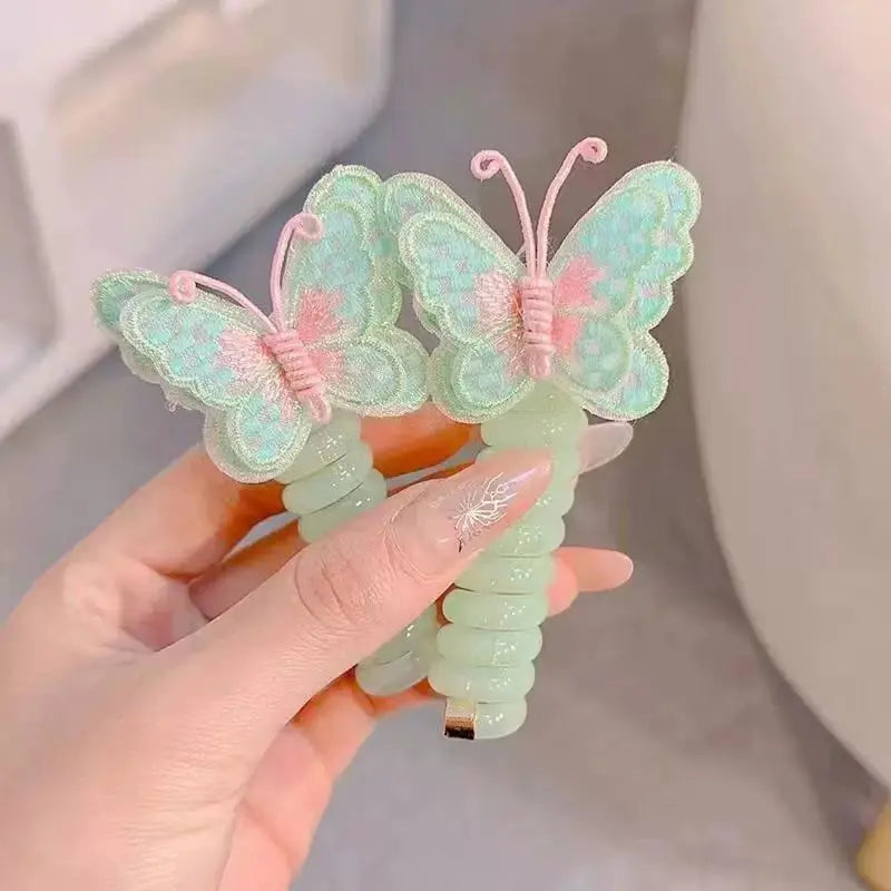 1+1 GRATIS | LittleBloom™ - Schmetterlings-Haargummis im Spiraldesign – Süßes Geschenk für Tochter & Enkelin