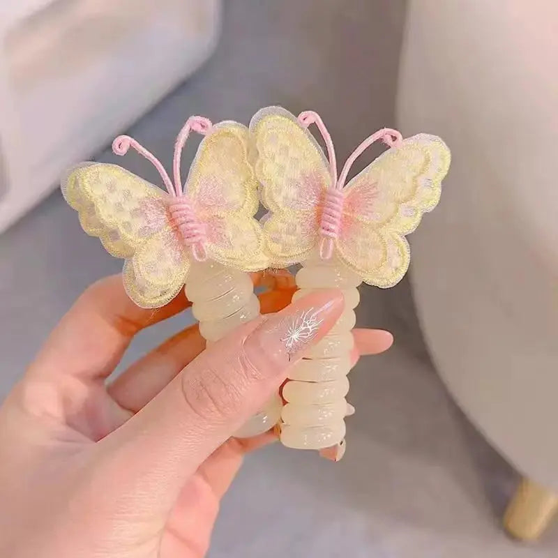 1+1 GRATIS | LittleBloom™ - Schmetterlings-Haargummis im Spiraldesign – Süßes Geschenk für Tochter & Enkelin